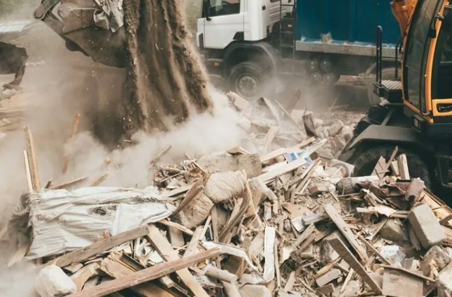 crew sorting debris at a construction site